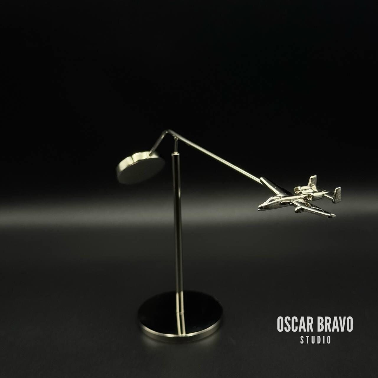 A10 fighter jet chrome balance model on desk – kinetic desk sculpture