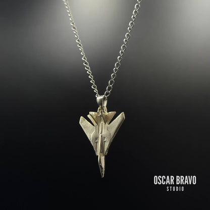 Silver-plated F-14 Tomcat fighter jet necklace on a black background, crafted from brass with fine detailing. A sleek aviation accessory designed for pilots, collectors, and aviation enthusiasts.