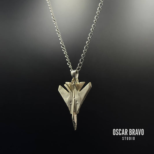 Silver-plated F-14 Tomcat fighter jet necklace on a black background, crafted from brass with fine detailing. A sleek aviation accessory designed for pilots, collectors, and aviation enthusiasts.