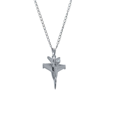 Silver airplane pendant on a chain against a white background